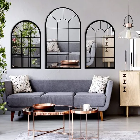 Small-living-room-metal-mirrors-and-gray-seating-area